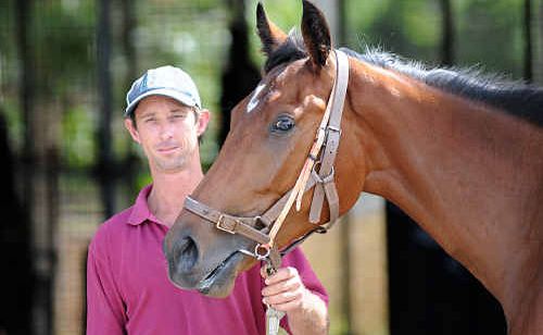 Trainer Steven Thomas with Wendy Green’s horse Cuddle Duck ready for its first race in Gympie. Trainer Steven Thomas with Wendy Green’s horse Cuddle Duck ready for its first race in Gympie.